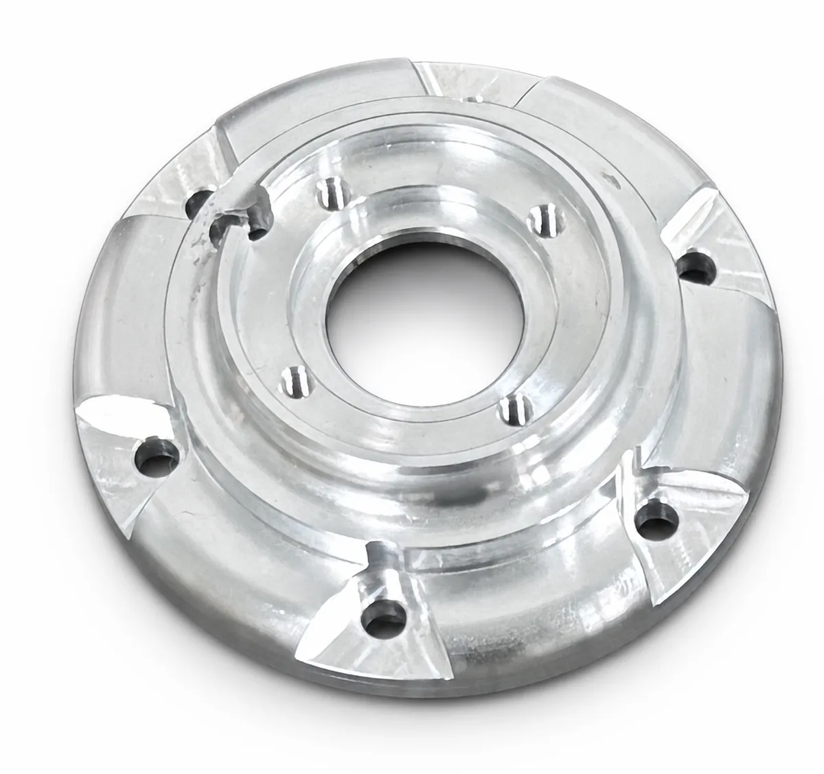 Five-axis machined circular component on a white background