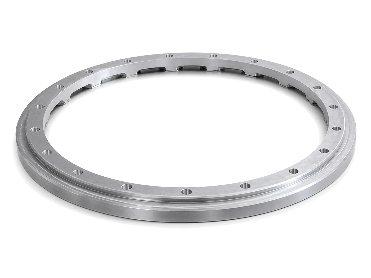 Large circular magnesium-alloy CNC milling component with precision holes and machined surfaces.
