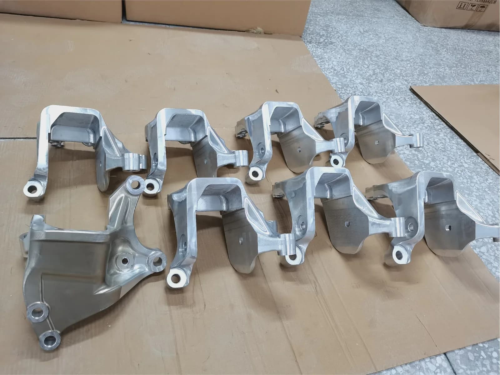 Batch of machined automotive brackets