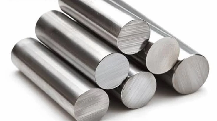 Round magnesium material bars on a clean neutral background