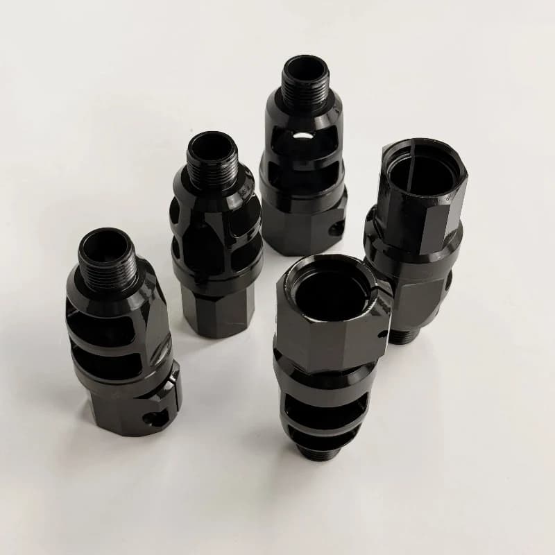 Black finished 4140 steel precision turn-mill connectors